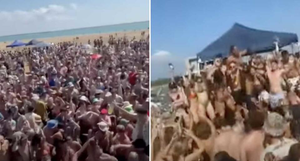 Hundreds of people party on a Darwin sandbar.