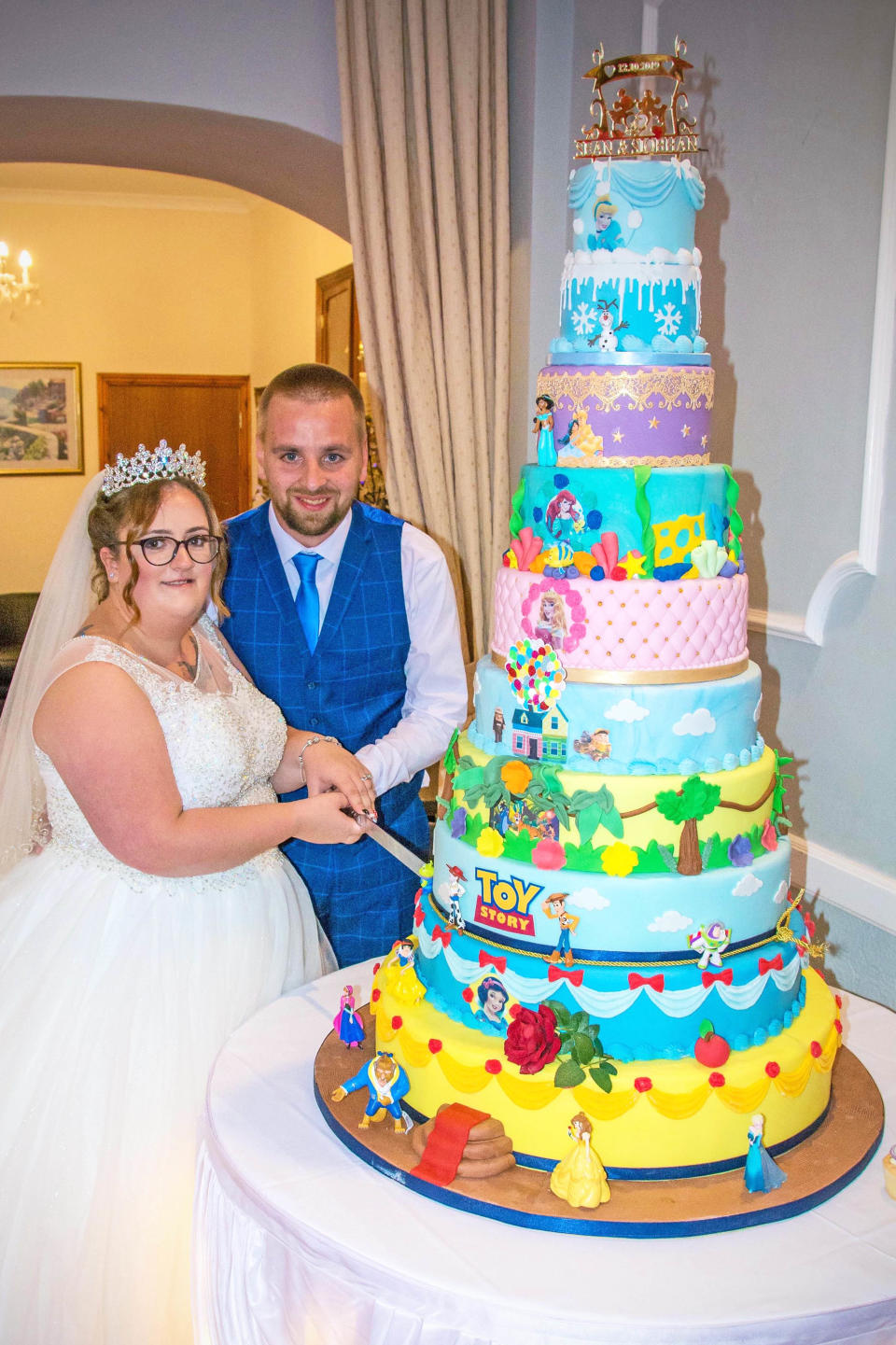 Disney superfans Siobhan Perdue, 24, and Sean, 29, tied the knot on October 12. [Photo: Caters]