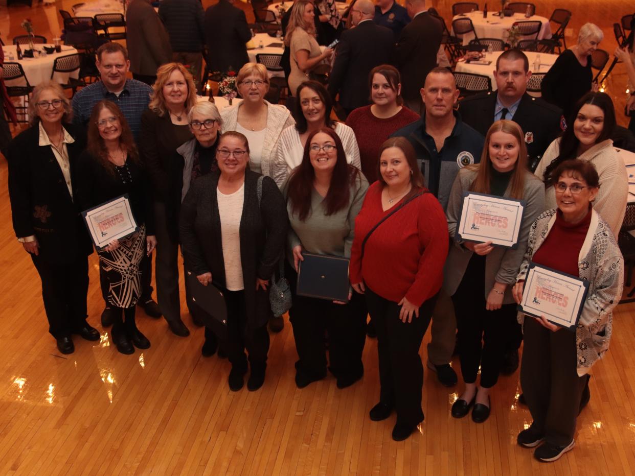 Representatives of agencies and organizations that helped the residents of the Riverview Terrace Apartments when the building was condemned and had to be evacuated in July 2022 accepted the Riverview Terrace Heroes awards Nov. 9 at the Everyday Heroes Awards at the Adrian Armory Events Center.