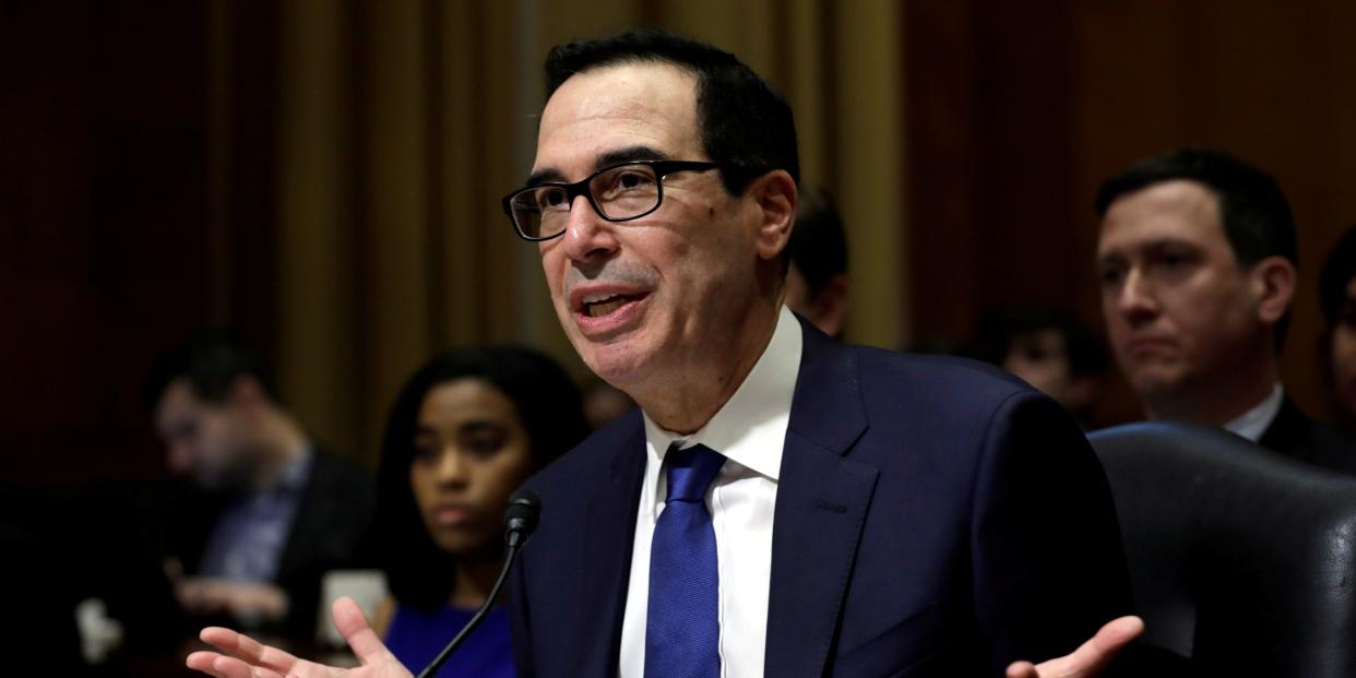 FILE PHOTO: U.S. Treasury Secretary Steven Mnuchin testifies before the Senate Finance Committee during a hearing on Capitol Hill in Washington, U.S., February 12, 2020. REUTERS/Yuri Gripas/File Photo