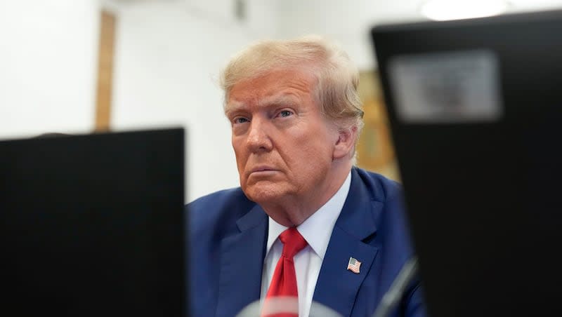 Former President Donald Trump sits in the courtroom before the start of closing arguments in his civil business fraud trial at New York Supreme Court, Jan. 11, 2024, in New York. Judge Anil Singh, a New York appellate judge, has refused to halt collection of Trump's $454 million civil fraud penalty while he appeals, rejecting the former president's request that he be allowed to post a bond covering just a fraction of what he owes.