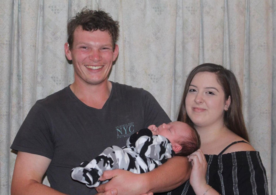 Erin Duffy, pictured with Parker and her partner Tyler, said she first noticed the blood during bottle time on Monday. Photo: Supplied