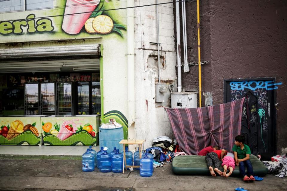 Mexicans wait to be moved to a shelter due a storm forecast in Ciudad Juarez, Mexico on 30 September 2019.