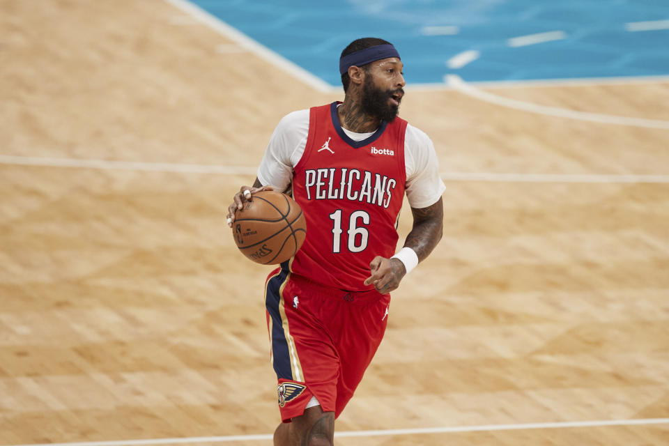 New Orleans Pelicans forward James Johnson (16) brings the ball up during the first half against the Charlotte Hornets in an NBA basketball game Sunday, May 9, 2021, in Charlotte, N.C. (AP Photo/Brian Westerholt)