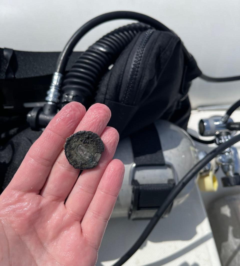 A silver coin found by Matawan diver Justin Dapolito during an expedition in the Caribbean.
