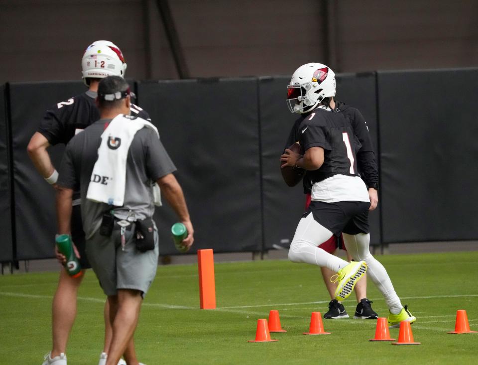 Aug 8, 2022; Glendale, Arizona, U.S.;  Arizona Cardinals quarterback Kyler Murray (1) performs a drill during training camp at State Farm Stadium.