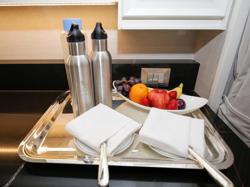 water and fruit in Regent Seven Seas Grandeur's concierge suite