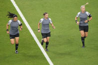 Referee Stephanie Frappart, centre, assistants referee Neuza Back, right, and Karen Diaz warm up before the World Cup group E soccer match between Costa Rica and Germany at the Al Bayt Stadium in Al Khor , Qatar, Thursday, Dec. 1, 2022. (AP Photo/Ariel Schalit)