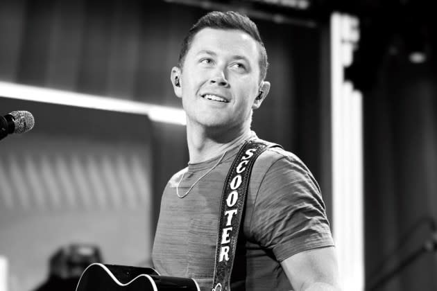Scotty McCreery's new album 'Rise & Fall' finally gives the deep-voiced country singer the respect he deserves. - Credit: Jason Kempin/Getty