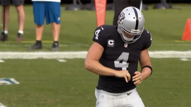 Derek Carr surveyed the damage and rushed immediately off the field. Pic: NFL