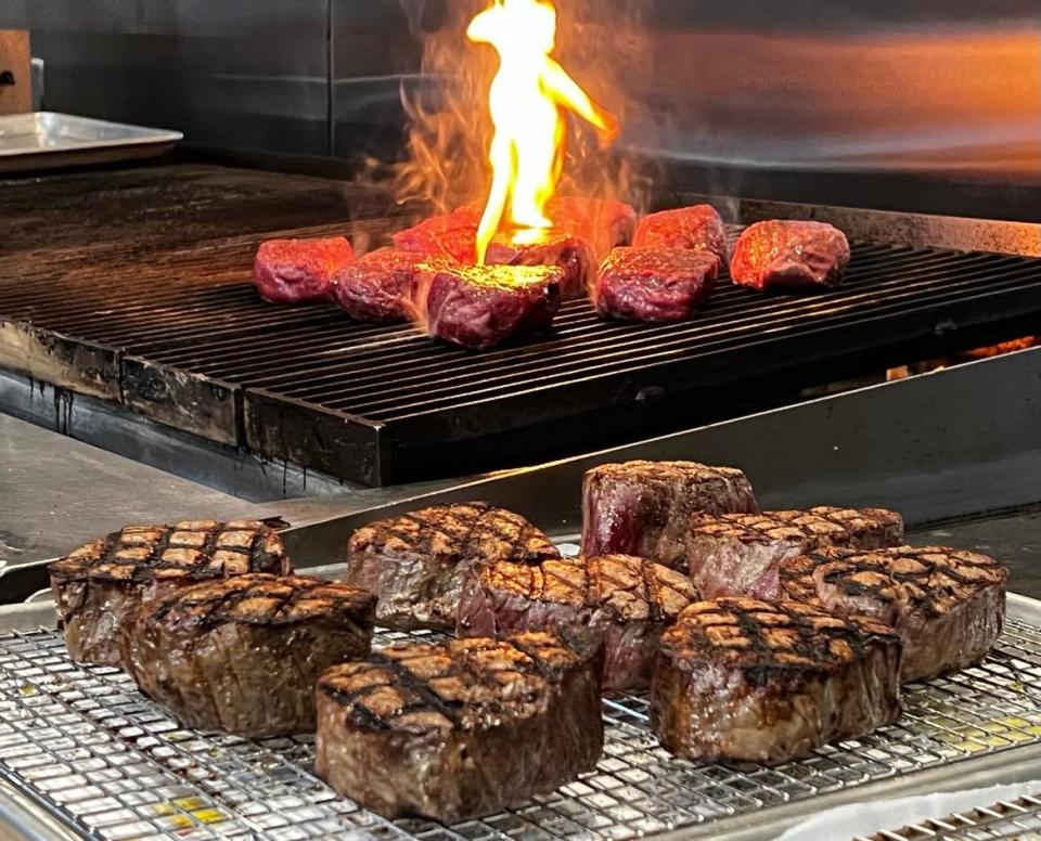 Steaks cook in the kitchen of the culinary center at Certified Angus Beef in Wooster. Chefs at Certified Angus Beef have created the dishes to be served at the Aug. 4 Gold Jacket Dinner during the Pro Football Hall of Fame Enshrinement Festival.