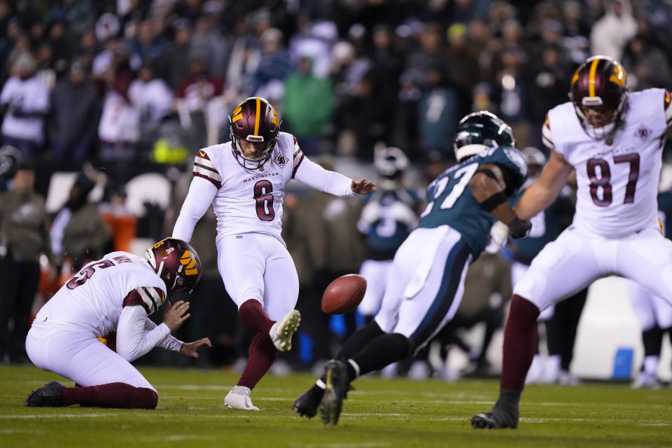 Washington Commanders place kicker Joey Slye (6) kicks a field goal during the second half of an NFL football game against the Philadelphia Eagles, Monday, Nov. 14, 2022, in Philadelphia. (AP Photo/Matt Rourke)