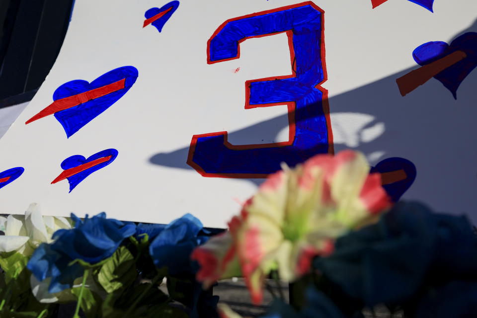 A sign with the number of Buffalo Bills' Damar Hamlin is seen for the display set-up outside of University of Cincinnati Medical Center, Wednesday, Jan. 4, 2023, in Cincinnati. Hamlin was taken to the hospital after collapsing on the field during the Bill's NFL football game against the Cincinnati Bengals on Monday night. (AP Photo/Aaron Doster)