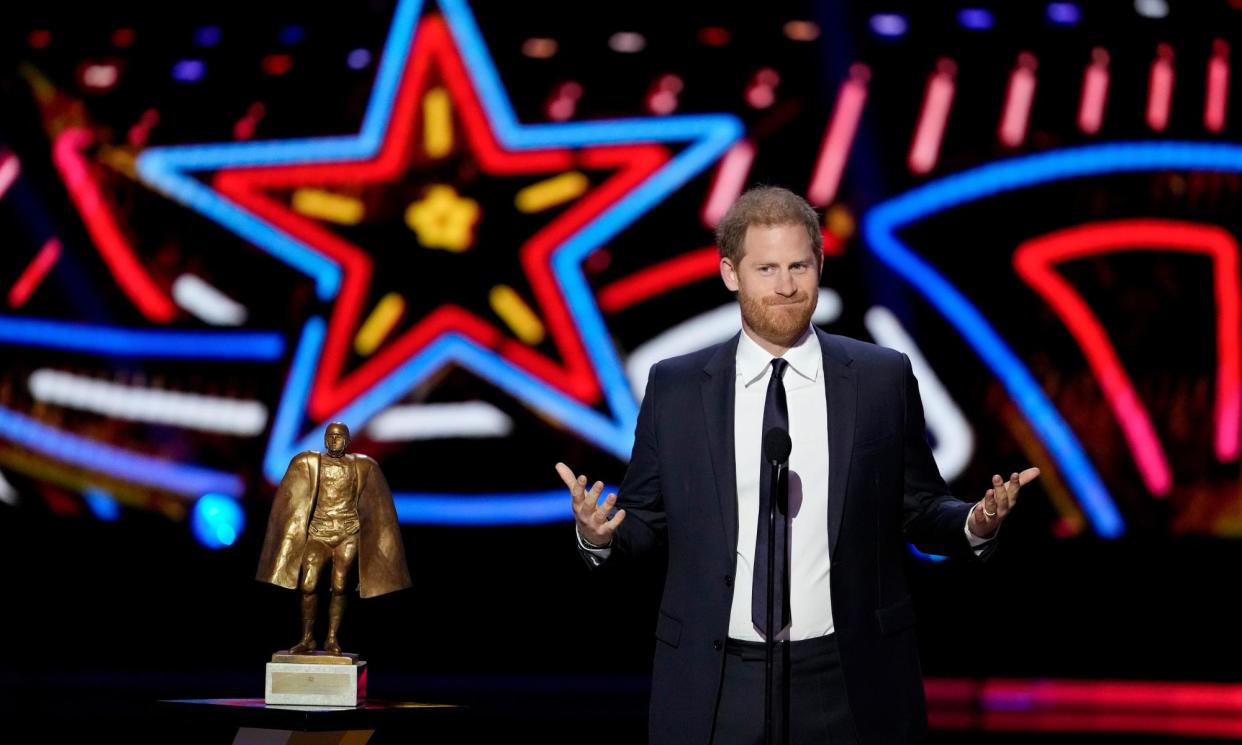 <span>Prince Harry presents the Walter Payton Man of the Year Award during the NFL Honours award show in Las Vegas in February.</span><span>Photograph: David J Phillip/AP</span>