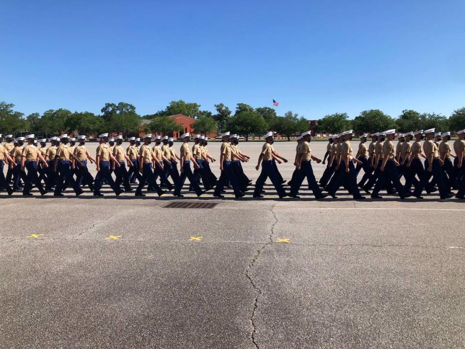 New Marines march in parade formation during Parris Island graduation May 7, 2021.