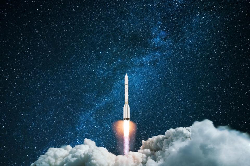 Rocket soaring into space. 