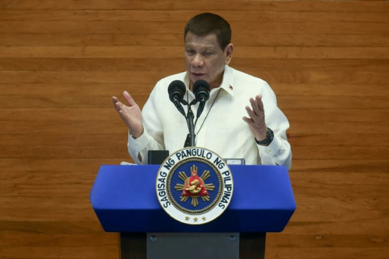 FILE PHOTO: President Rodrigo Duterte overturned the government's decision to ease stay-at-home orders for children aged 10 to 14. REUTERS/Czar Dancel