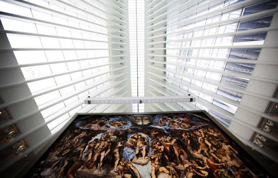 <p>“The Last Judgement” stands above the “Up Close: Michelangelo’s Sistine Chapel” re-creation exhibit at the Oculus at Westfield World Trade Center in New York. The exhibit features 34 reproductions, including “The Creation of Adam.” (AP Photo/Michael Noble Jr.) </p>