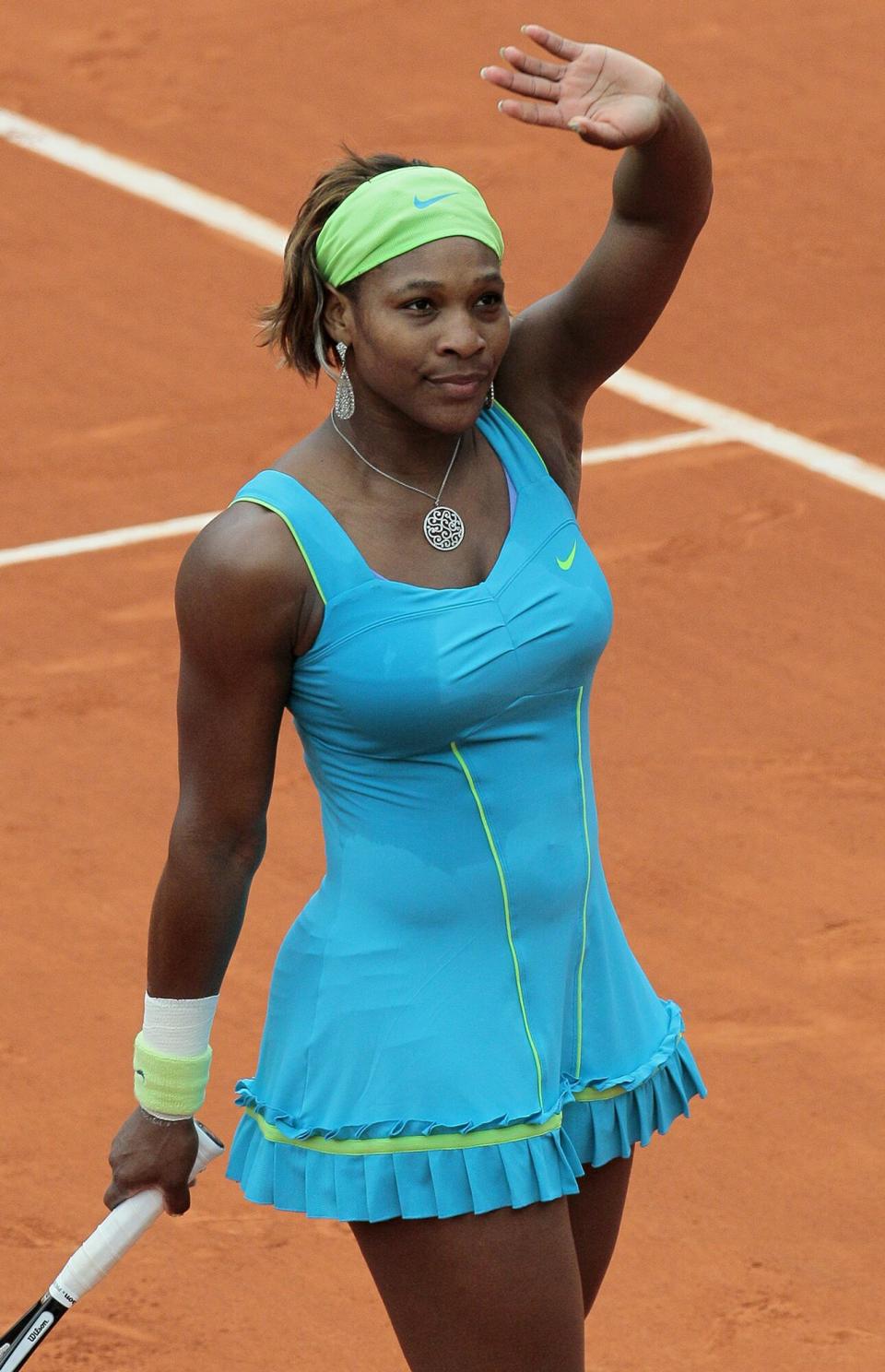 Serena Williams celebrates after winning her women's fourth round match agaisnt Israel's Shahar Peer in the French Open tennis championship at the Roland Garros stadium, on May 31,2010 in Paris. Williams won 6-2, 6-2. AFP PHOTO JACQUES DEMARTHON