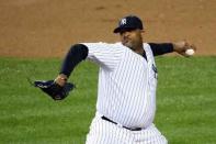 Oct 1, 2015; Bronx, NY, USA; New York Yankees starting pitcher CC Sabathia (52) pitches during the first inning against the Boston Red Sox at Yankee Stadium. Anthony Gruppuso-USA TODAY Sports