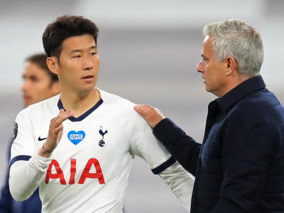 Mourinho embraces Son after victory over Everton (Getty)