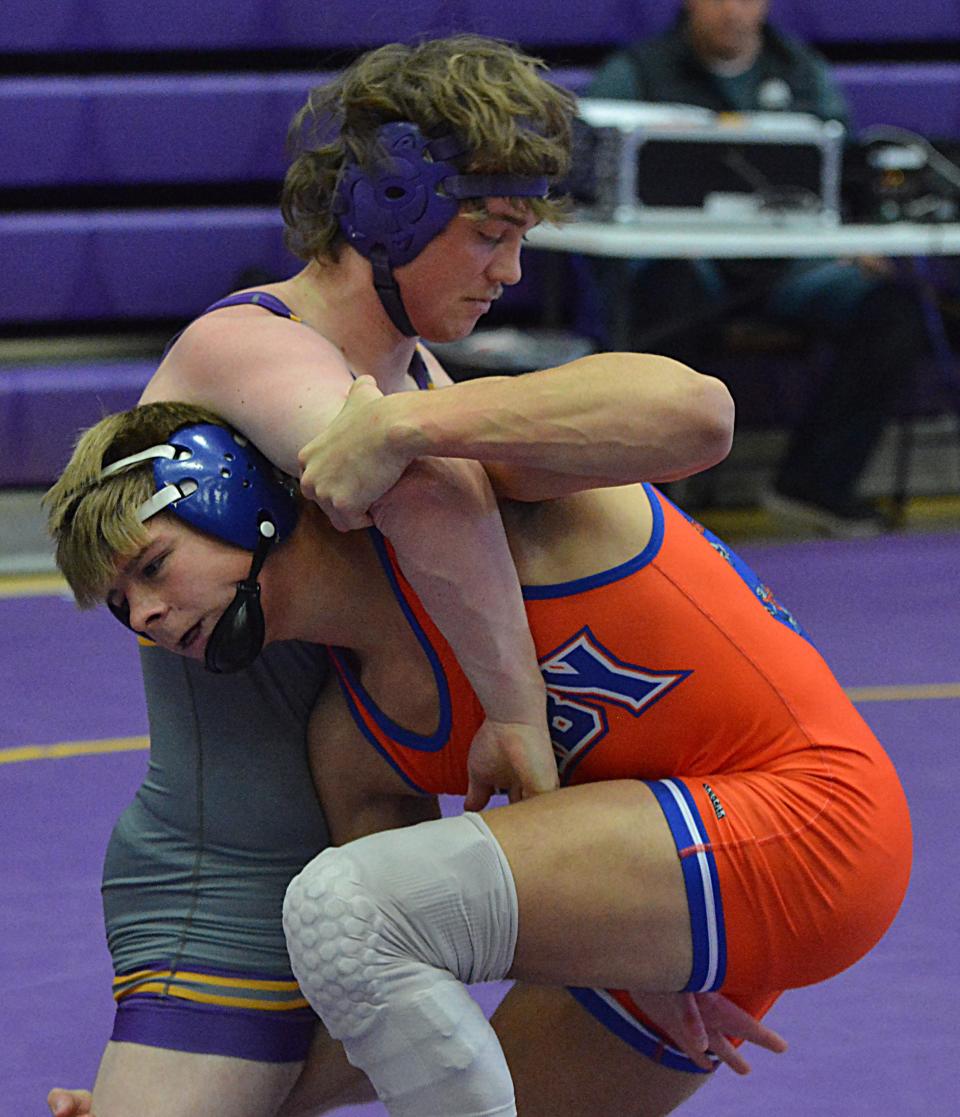 Watertown's Brock Eitreim (left) and Canby's Nick Wagner fight for control during their 190-pound match in the Marv Sherrill Dual wrestling tournament on Saturday, Dec. 2, 2023 in the Watertown Civic Arena.