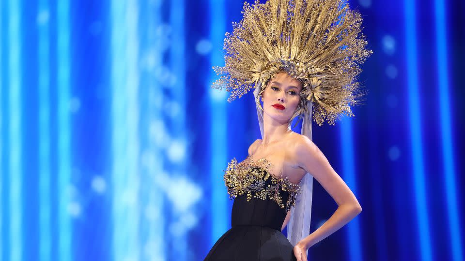 Miss Slovakia's costume featured an ornate headdress crafted from straw. - Hector Vivas/Getty Images