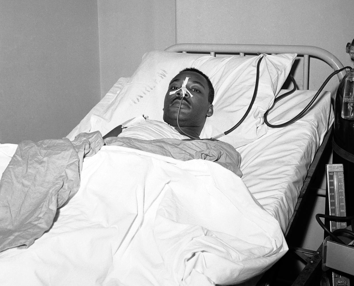 Martin Luther King Jr. recovers from surgery in bed at New York’s Harlem Hospital following an operation to remove steel letter opener from his chest after being stabbed by a mentally disturbed woman, Sept. 21, 1958. (Photo: John Lent/AP)