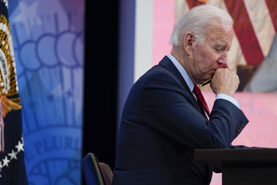 FILE - President Joe Biden listens during a virtual meeting with Democratic governors on the issue of abortion rights, in the South Court Auditorium on the White House campus, July 1, 2022, in Washington. Biden is marking his second Fourth of July since taking office with a far different political atmosphere than the first. (AP Photo/Evan Vucci, File)