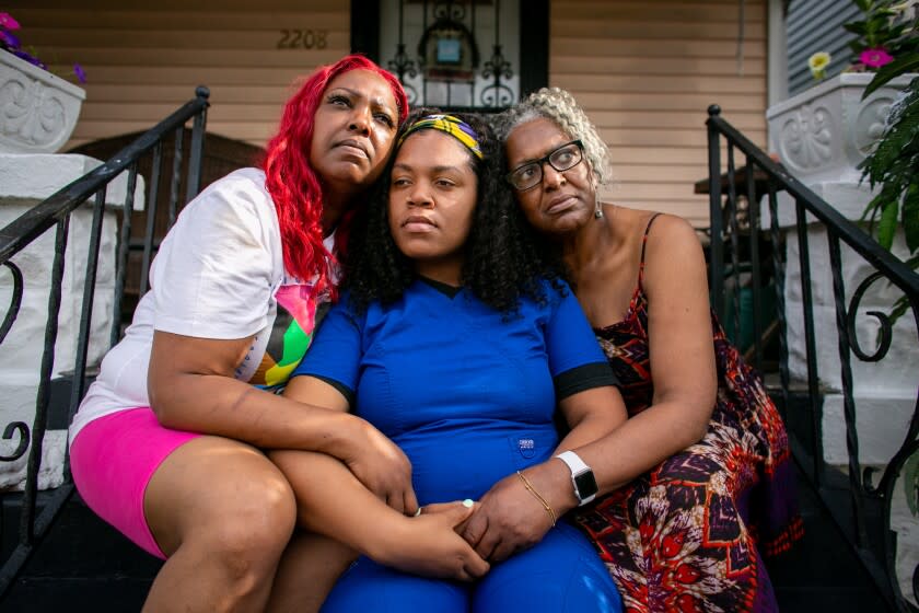 LOUISVILLE, KY - MAY 21: From Left - Maya, Nakayla, and Mattie Little pose for a portrait on the front steps of Mattie's home on Friday, May 21, 2021 in Louisville, KY. (Jason Armond / Los Angeles Times)