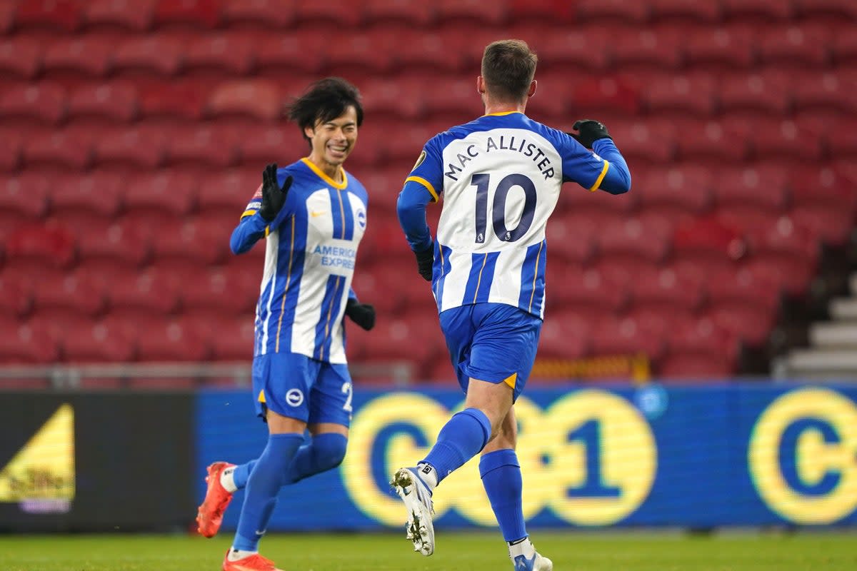 Brighton’s Alexis Mac Allister, right, celebrates after scoring at Middlesbrough (Owen Humphreys/PA) (PA Wire)