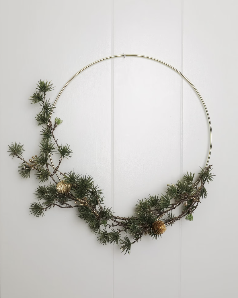 Gold and Pine Winter Wreath (Photo via Etsy)