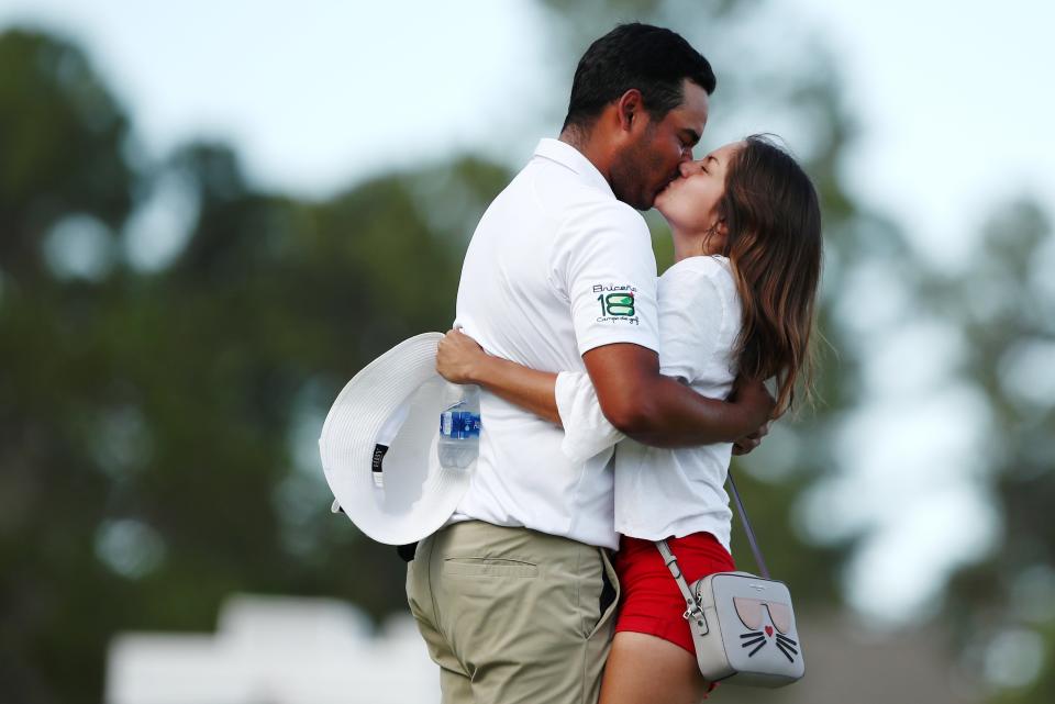 JACKSON, MISSISSIPPI - SEPTEMBER 22: Sebastian Munoz of Colombia reacts with his girlfriend Daniela Granados after putting in win in a sudden death playoff on the 18th hole during the final round of the Sanderson Farms Championship at The Country Club of Jackson on September 22, 2019 in Jackson, Mississippi. (Photo by Marianna Massey/Getty Images)