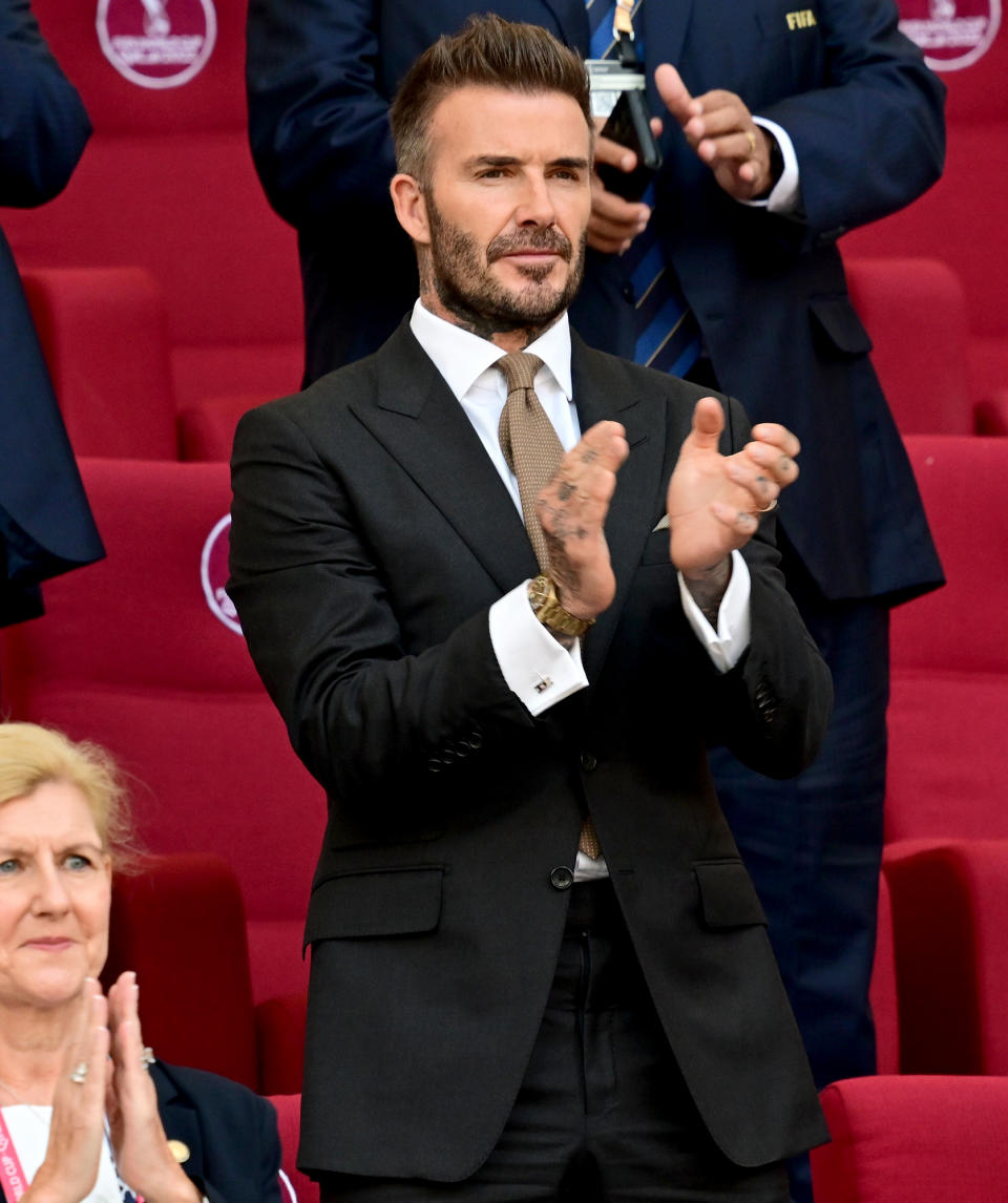 <p><a href="https://people.com/tag/david-beckham/" rel="nofollow noopener" target="_blank" data-ylk="slk:David Beckham;elm:context_link;itc:0;sec:content-canvas" class="link ">David Beckham</a> applauds while watching the England vs. Iran FIFA World Cup 2022 match in Qatar on Nov. 21. </p>