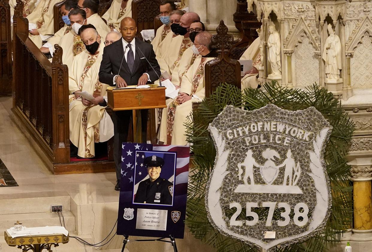 New York City Mayor Eric Adams addresses mourners during a funeral service for NYPD Officer Jason Rivera Friday, Jan. 28, 2022, at St. Patrick's Cathedral in Manhattan, New York. 