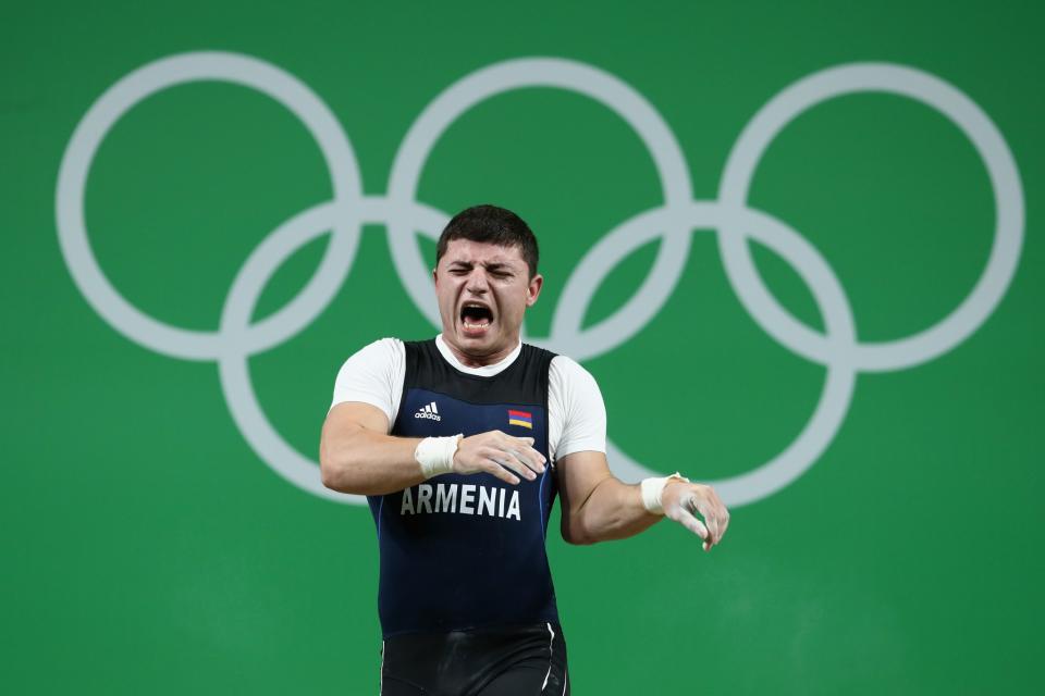 <p>Hyperextension gone wrong. Armenian weightlifter Andranik Karapetyan was in second place when he lifted the weights above his head. Shortly after his arm went backward, resulting in what appeared to be a dislocated elbow. OUCH! </p>