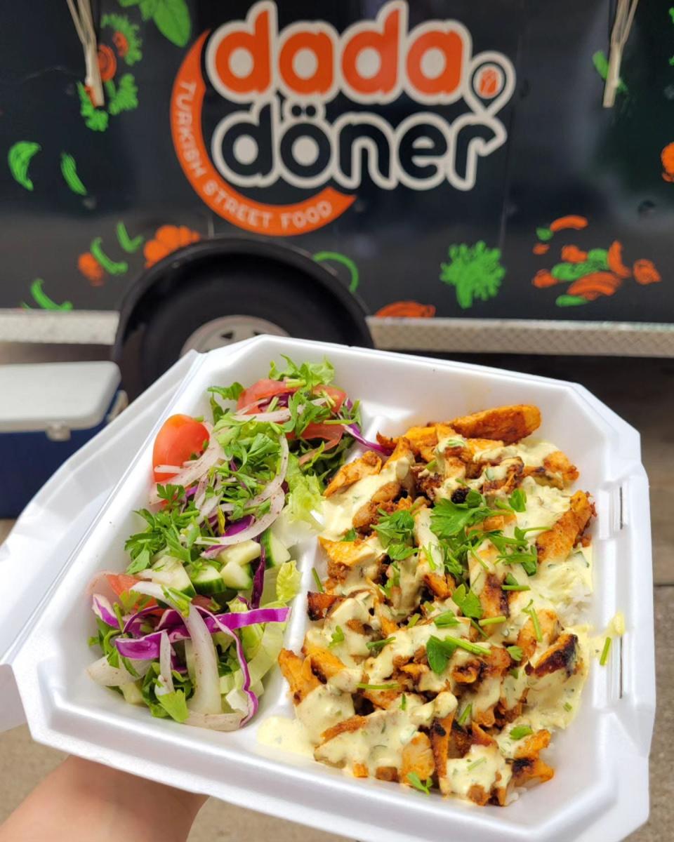 A chicken döner plate with rice and salad