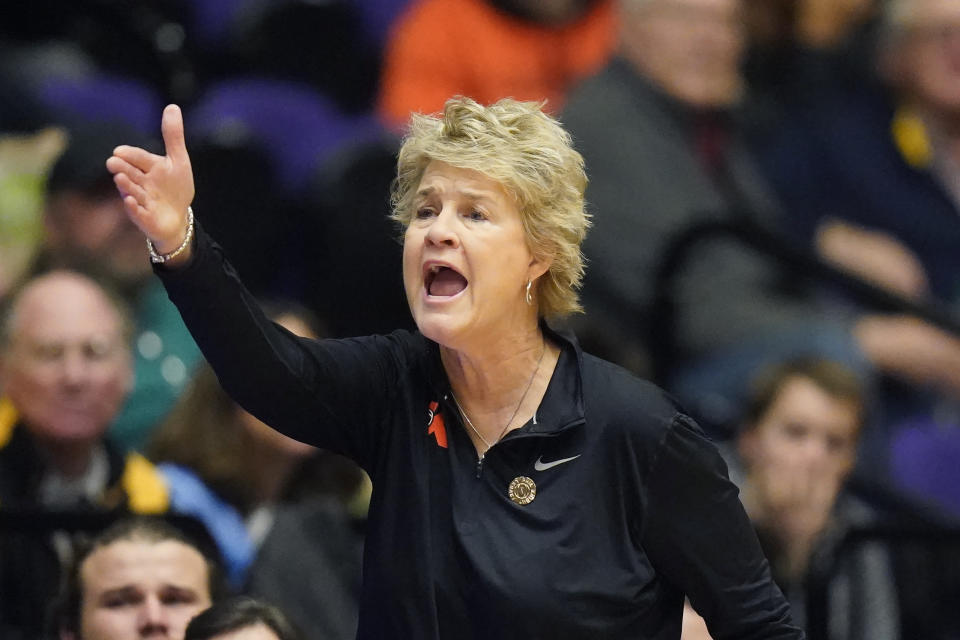 Iowa head coach Lisa Bluder shouts to her team during the first half of an NCAA college basketball game against Oregon State in the Phil Knight Legacy tournament Friday, Nov. 25, 2022, in Portland, Ore. (AP Photo/Rick Bowmer)