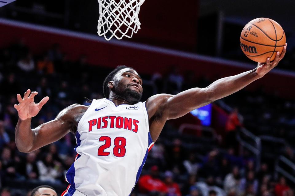 Detroit Pistons center Isaiah Stewart grabs a rebound against Utah Jazz during the first half at Little Caesars Arena in Detroit on Thursday, Dec. 21, 2023.