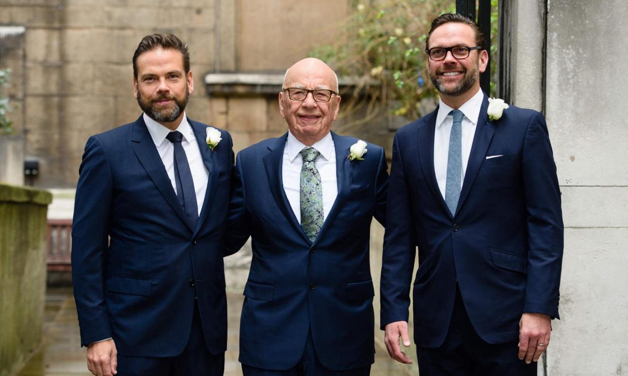 <span>Rupert Murdoch is flanked by his sons Lachlan, left, and James, right, at St Bride's church, London, on 5 March 2016.</span><span>Photograph: Leon Neal/AFP/Getty Images</span>