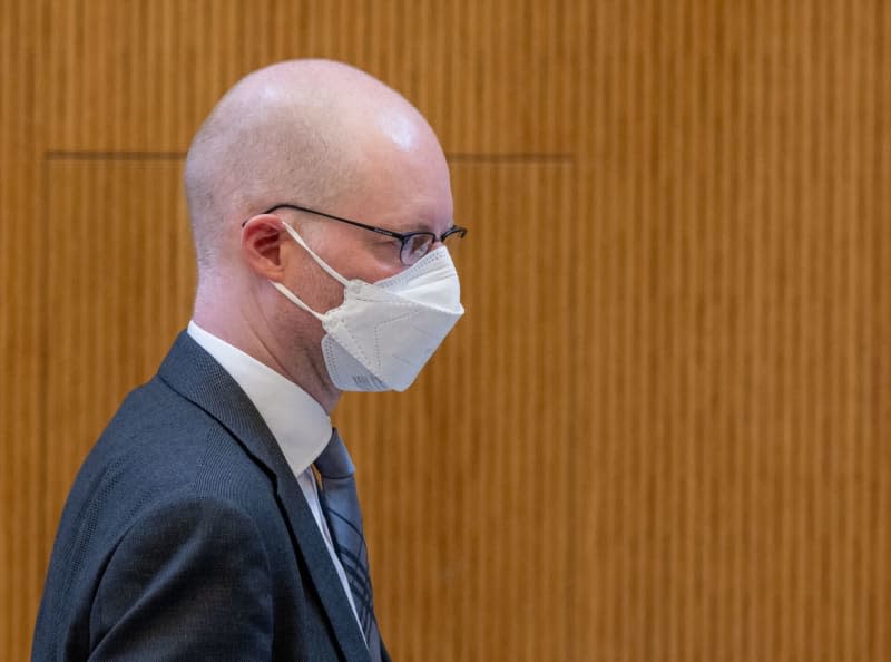 Wirecard crown witness Oliver Bellenhaus stands in the underground courtroom of Stadelhei prison. The key prosecution witness in Germany's sprawling fraud trial of disgraced payments group Wirecard has been released from custody after more than three and a half years. Peter Kneffel/dpa