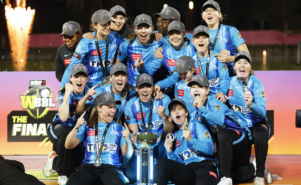 The Adelaide Strikers, pictured here celebrating their victory over the Sydney Sixers in the WBBL final.