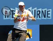 Milos Raonic of Canada serves to Daniel Gimeno-Traver of Spain during their men's singles match at the Australian Open 2014 tennis tournament in Melbourne January 14, 2014. REUTERS/Brandon Malone (AUSTRALIA - Tags: SPORT TENNIS)