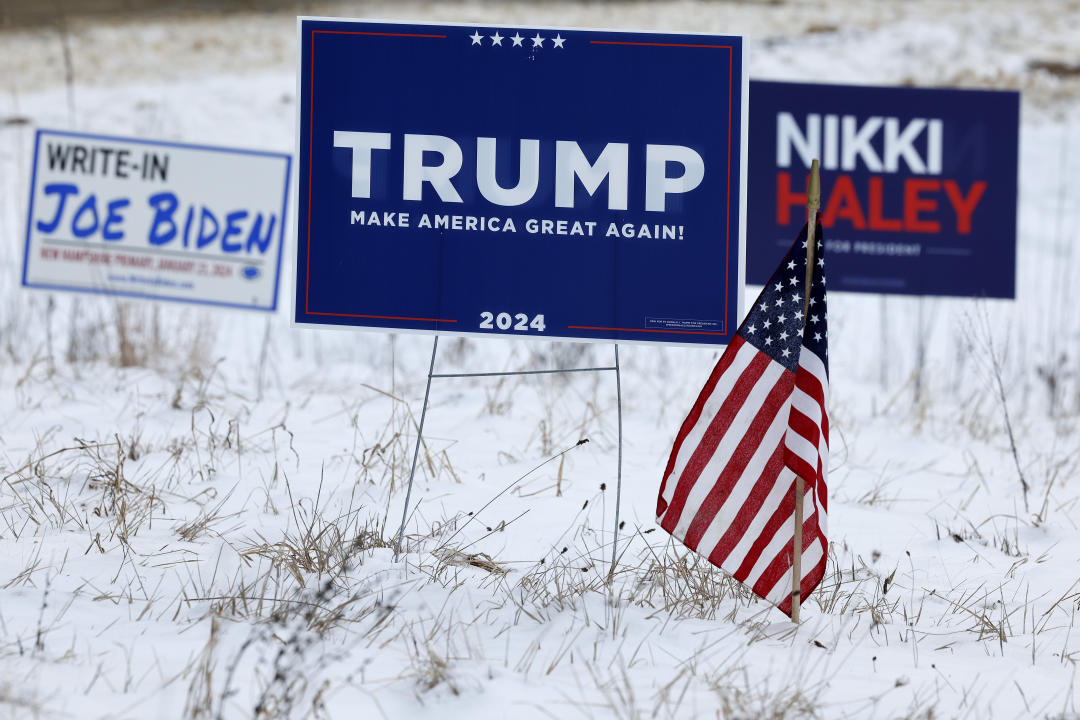 Campaign signs for Biden, Trump and Haley.