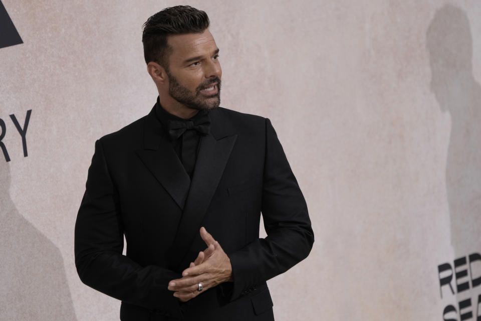 Ricky Martin poses for photographers upon arrival at the amfAR Cinema Against AIDS benefit at the Hotel du Cap-Eden-Roc, during the 75th Cannes international film festival, Cap d'Antibes, southern France, Thursday, May 26, 2022. (Photo by Joel C Ryan/Invision/AP)