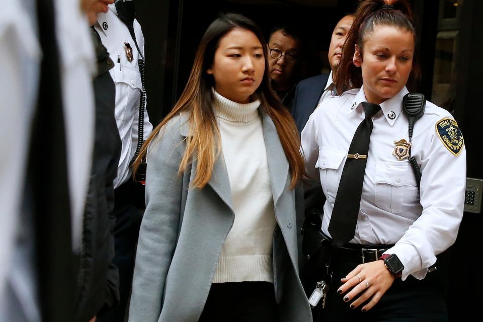 Inyoung You leaves Suffolk Superior Court in Boston, Friday, Nov. 22, 2019 after pleading not guilty to involuntary manslaughter. Prosecutors say You sent Alexander Urtula more than 47,000 text messages in the last two months of their relationship, including many urging him to "go kill yourself."