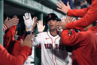 Boston Red Sox's Triston Casas is congratulated after his two-run home run during the fifth inning of a baseball game against the Baltimore Orioles, Wednesday, April 10, 2024, in Boston. (AP Photo/Charles Krupa)