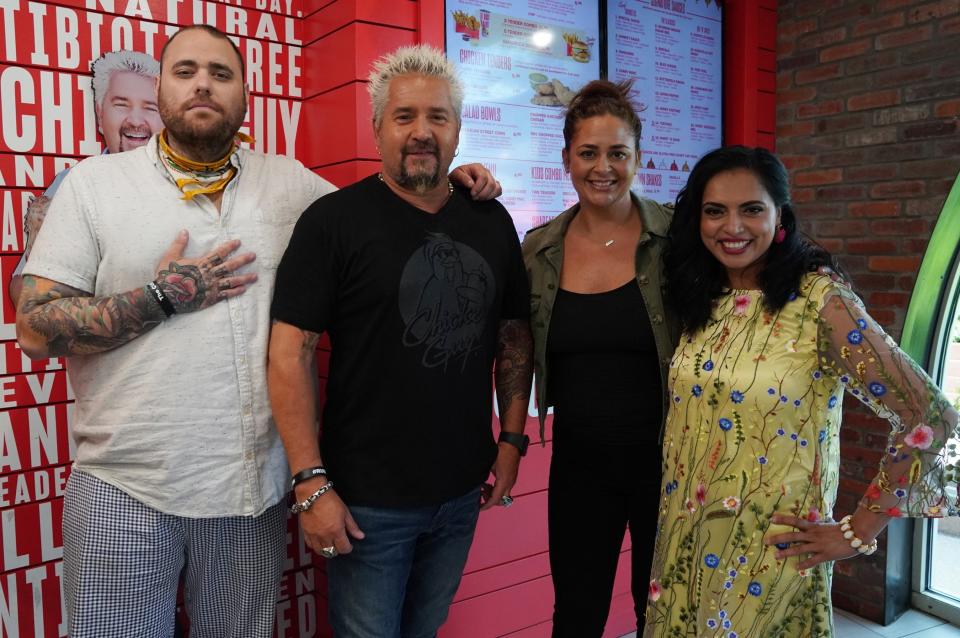 Chef Christian Petroni, far left, with Guy Fieri, on the set of Guy's "Chance of a Lifetime."