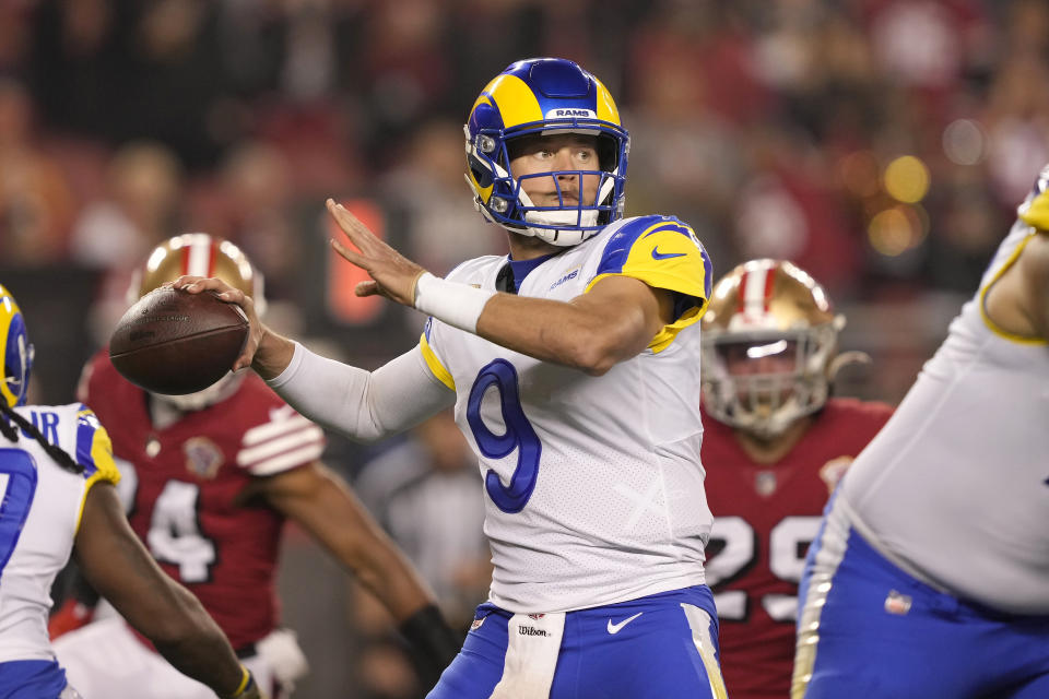 Los Angeles Rams quarterback Matthew Stafford (9) passes against the San Francisco 49ers during the first half of an NFL football game in Santa Clara, Calif., Monday, Nov. 15, 2021. (AP Photo/Tony Avelar)