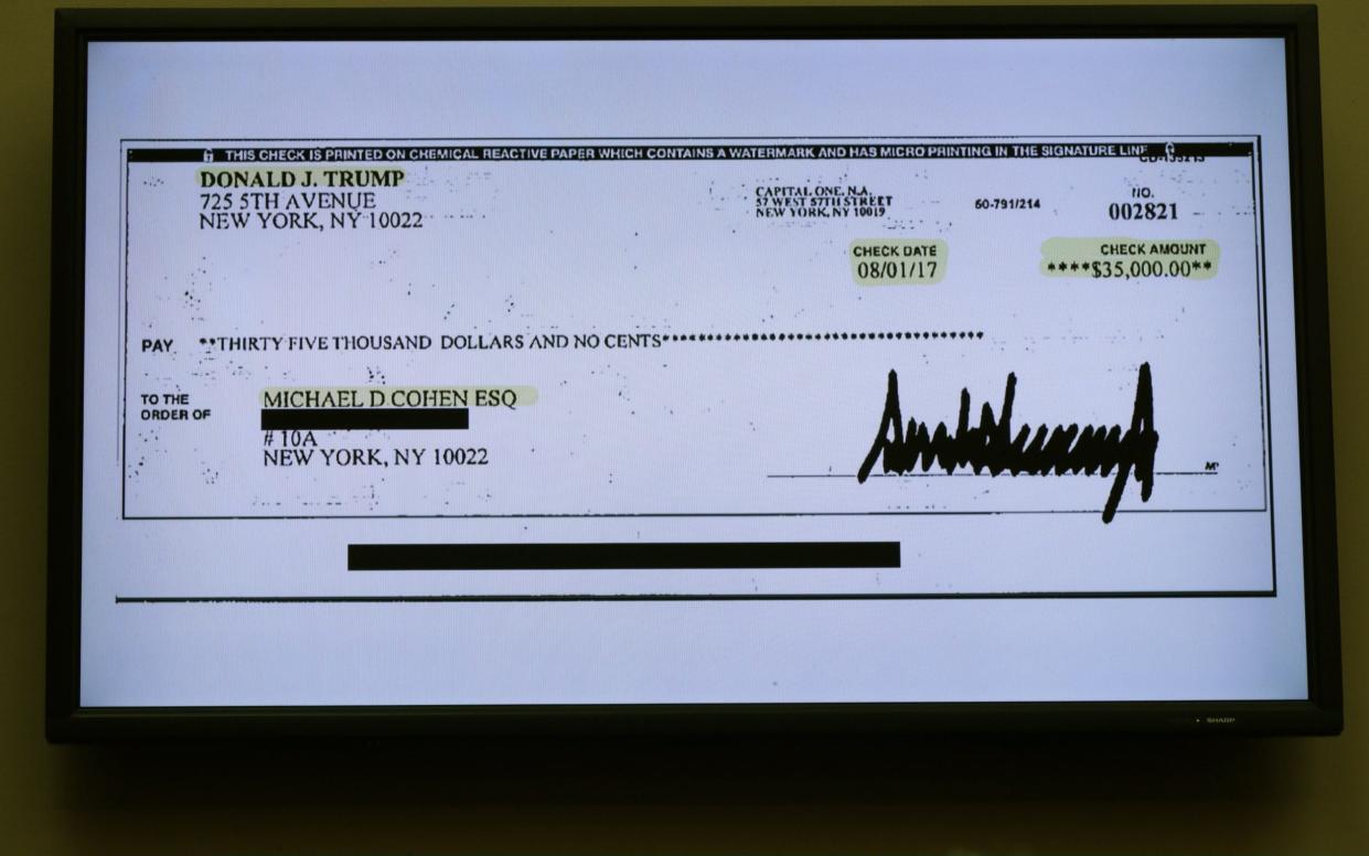 A copy of a cheque paid to Michael Cohen by Donald Trump is central to the case against the ex-president